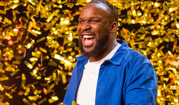Comedian Axel Blake gets BGT's Golden Buzzer | Simon Cowell puts stand-up through to next round