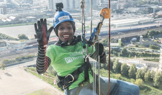 Hughes a brave girl? | London abseils off Olympic tower for charity