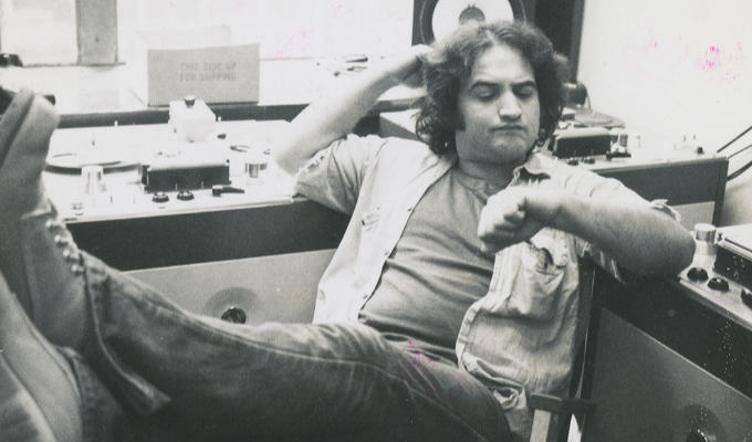 John Belushi with reel-to-reel tape deck