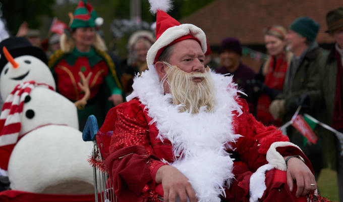 Johnny as Santa in shopping trolley