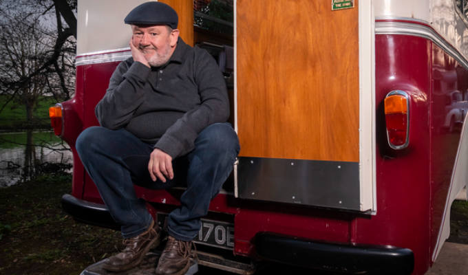 Johnny with one of the glamping buses