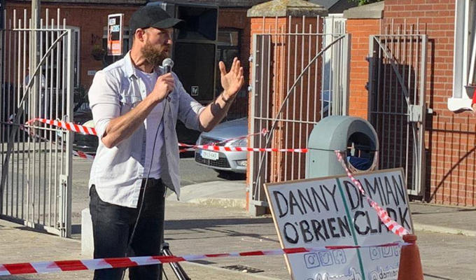 Comedy takes to the streets... | Inventive comedians stage a gig outside a block of flats