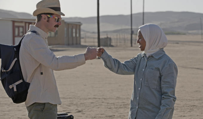 Wozniak and Ola fist-bump in Namibia