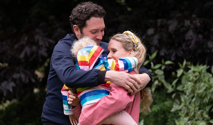 Lucy Jon and their daughter all hug in Meet The Richardsons