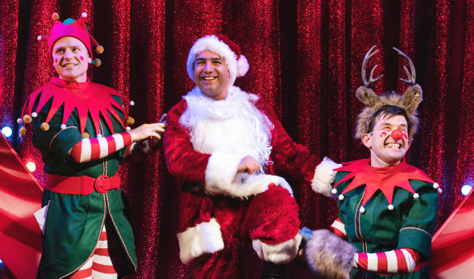 Mr Swallow as Santa with Elms as an elf and Hodgson as Rudolf