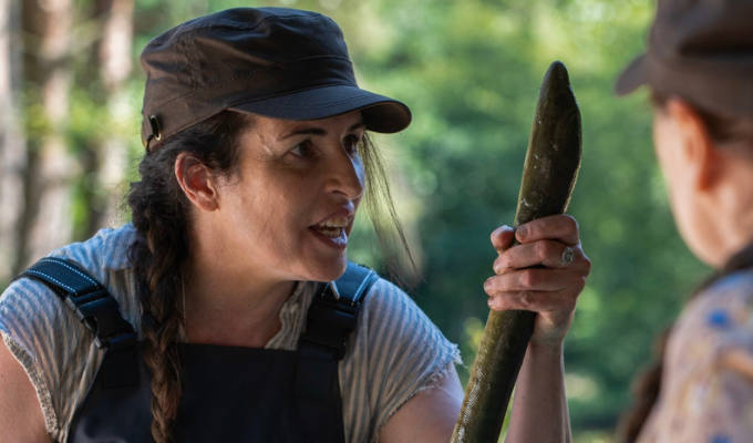 Agnes holding an eel