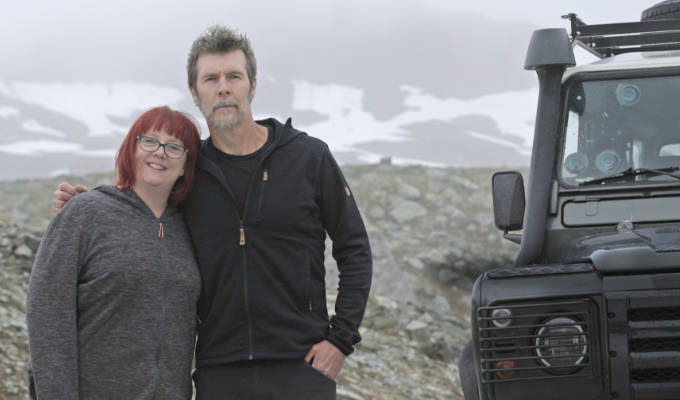 Rhod and Angela posing by their 4x4