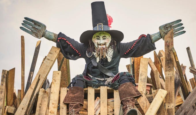 Paul Kaye as Guy Forks atop a bonfire in Worzel Gummidge